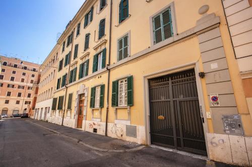 a row of buildings on the side of a street at Colosseo Suite Apartment in Rome