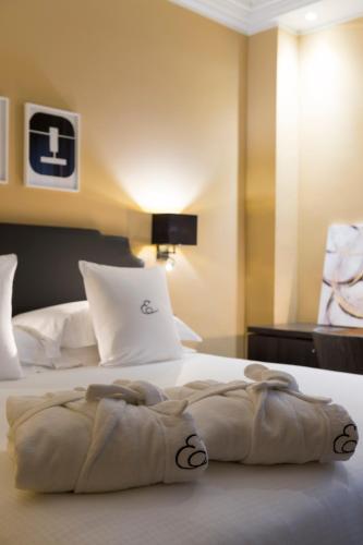 a hotel room with two beds in a room at Elizabeth Lifestyle Hotel in Bologna