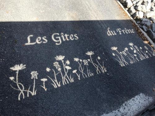 a book with the words less cities written on it at Gîtes du Frêne in Wattignies