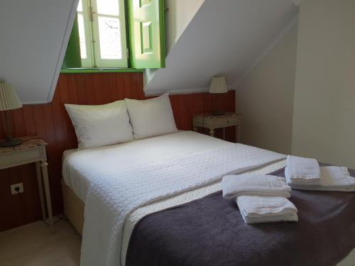 Cama ou camas em um quarto em Guesthouse Casa Pombal