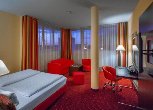 A bed or beds in a room at Best Western Plus Amedia Art Salzburg