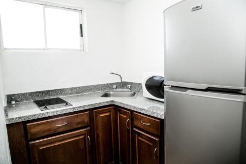 Dapur atau dapur kecil di Booking Dioh