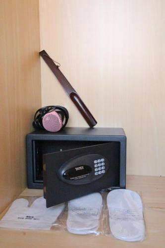 a radio with a microphone on top of it at Silken Hotel in Taipei