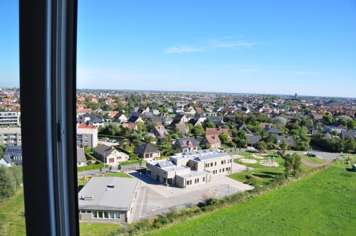 a view from a window of a town at SEA THE SEA - FEEL THE SEA - TOUCH THE SEA in Bredene