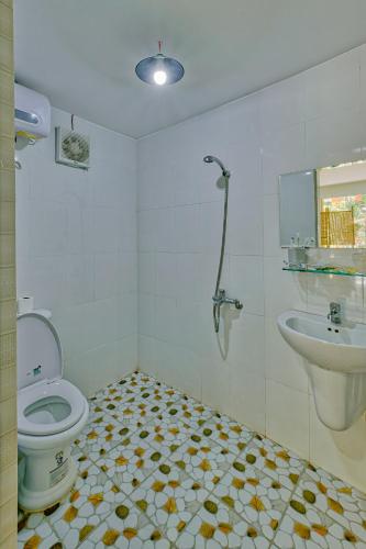 Ένα μπάνιο στο Le Robinet Homestay
