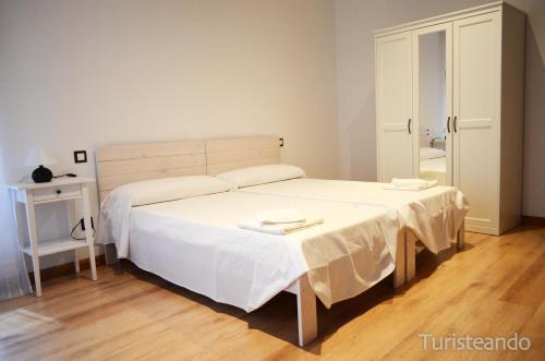 Postel nebo postele na pokoji v ubytování Apartamento Llerandi 1A - Céntrico y completamente reformado