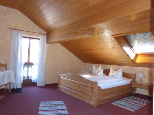 Säng eller sängar i ett rum på Giglerhof