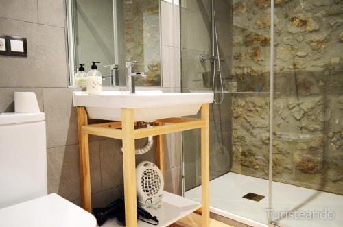 Koupelna v ubytování Apartamento Llerandi 1A - Céntrico y completamente reformado