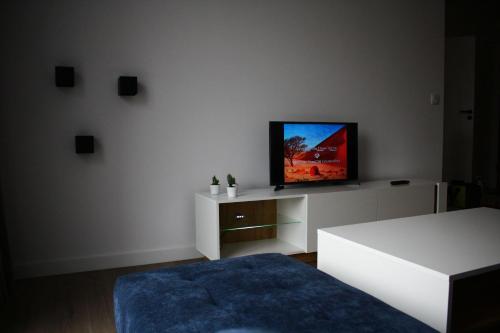 Posteľ alebo postele v izbe v ubytovaní Apartament 4 osobowy w Bel Mare