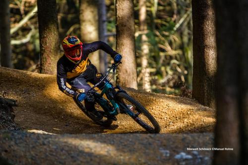 a person riding a bike on a dirt trail at Hotel Tannenhaus in Schöneck