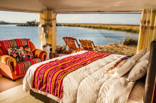 Postel nebo postele na pokoji v ubytování Luz del Titicaca Lodge