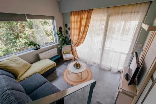 Гостиная зона в Loft Apartments