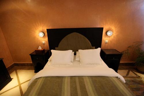 Ein Bett oder Betten in einem Zimmer der Unterkunft Riad Dar Haven