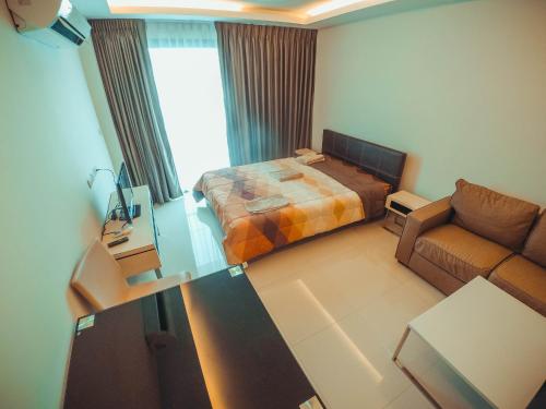 سرير أو أسرّة في غرفة في Club Royal suites