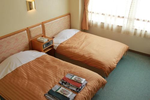 Postel nebo postele na pokoji v ubytování Manseiro