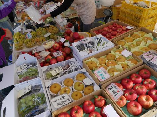 a display of apples and other fruits and vegetables at BEYOND HOTEL Takayama 2nd in Takayama