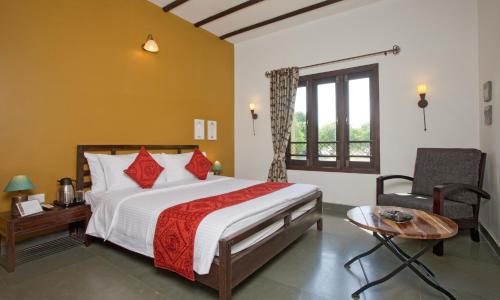 En eller flere senge i et værelse på Club Mahindra Sasan Gir