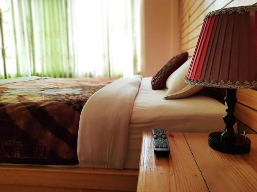 Postel nebo postele na pokoji v ubytování Hotel Diplomat