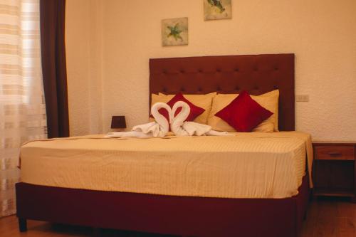 Sunville Hotel and Restaurantにあるベッド
