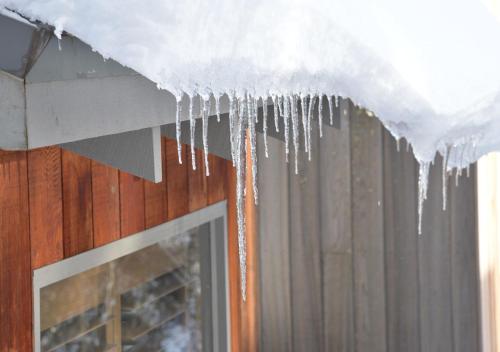 a bunch of icicles hanging from a ceiling at CHILL-OUT - Thredbo in Thredbo