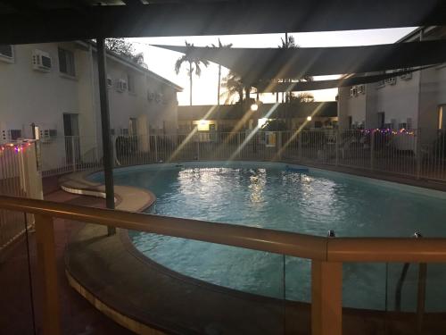 
The swimming pool at or near Emerald Central Hotel
