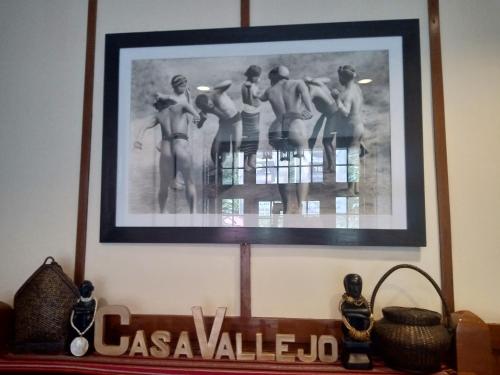 a picture of a group of men on a wall at Casa Vallejo Hotel Baguio in Baguio
