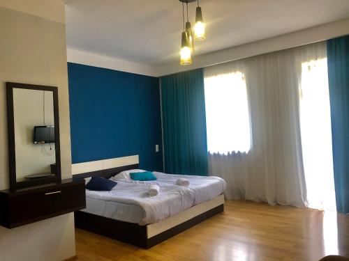 Postel nebo postele na pokoji v ubytování Hotel Hills