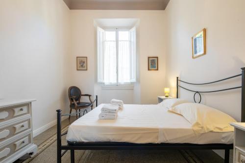 Säng eller sängar i ett rum på Santa Maria Novella 4 bedrooms