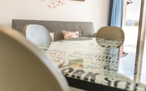 Cama o camas de una habitación en Appartamento Luigi climatizzato con veranda