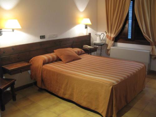 Кровать или кровати в номере Hotel El Puerto