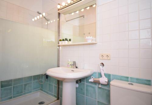 a bathroom with a sink and a mirror at Finca Siscelis 063 by Mallorca Charme in Santa Maria del Camí