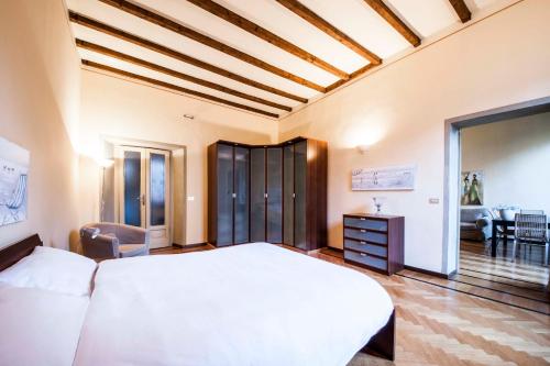 A bed or beds in a room at MERCALLI III