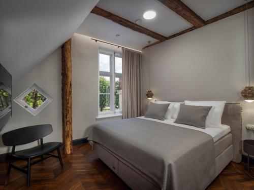 Postel nebo postele na pokoji v ubytování Boutique Hotel Rosenplänter