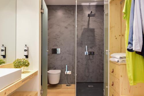 a bathroom with a shower and a sink at Dream Guincho in Cascais