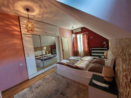 Postel nebo postele na pokoji v ubytování Hotel Bagineti