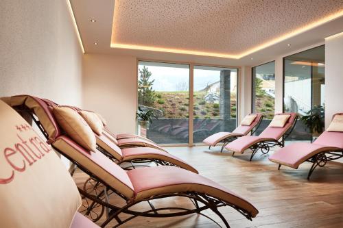 a row of chairs in a waiting room at Central Hotel & Apart mit Landhaus Central in Fügen