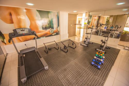 an overhead view of a gym with machines and weights at Luxor Cabo Branco Home Service in João Pessoa