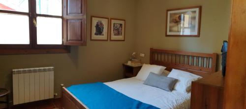 Postelja oz. postelje v sobi nastanitve Preciosa casa de campo a 1.5 km de la playa de La Marina