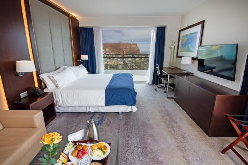 Katil atau katil-katil dalam bilik di Antay Hotel & Spa