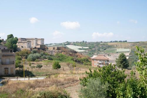 a view of a town with houses on a hill at LA CASA DI MAMMA 'NTO in Castrofilippo