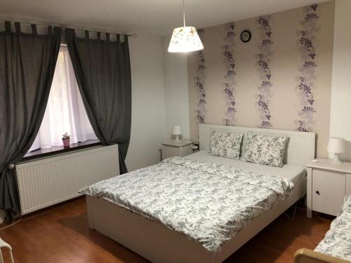Ένα ή περισσότερα κρεβάτια σε δωμάτιο στο Casa Bergwald