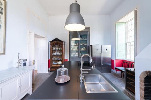 Kuchyňa alebo kuchynka v ubytovaní Villa Hacienda del Batán
