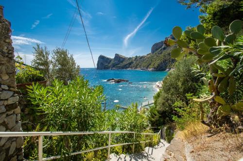 a view of the ocean from a beach at RELAIS TRITONE in Nerano