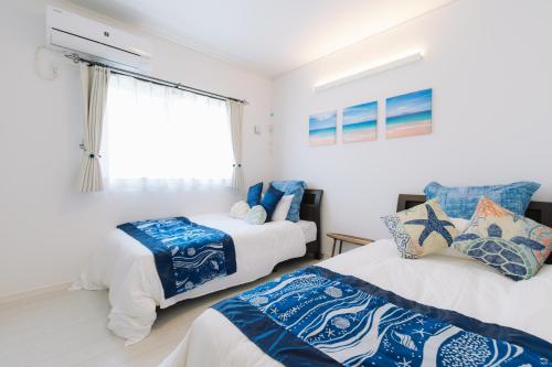 Ένα ή περισσότερα κρεβάτια σε δωμάτιο στο Villa Mahalo ＜1日１組限定＞