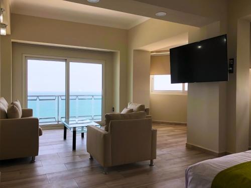 Televisyen dan/atau pusat hiburan di Hotel Lois Veracruz