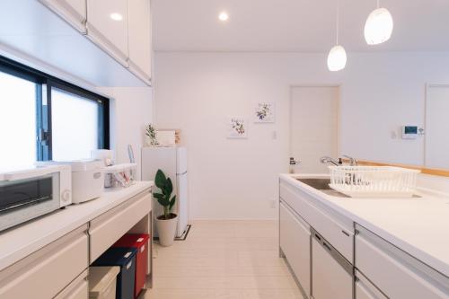 Cuisine ou kitchenette dans l'établissement Villa Mahalo ＜1日１組限定＞