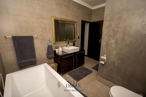 Un baño de Oryx B&B Reserved Guests Only