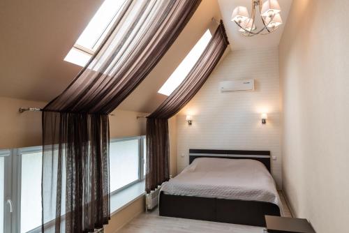 Voodi või voodid majutusasutuse Park-Hotel Vishnevaya Gora toas