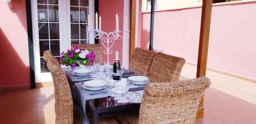 Restoranas ar kita vieta pavalgyti apgyvendinimo įstaigoje Rosas by Villas Rinamar