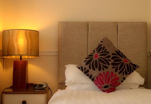 Katil atau katil-katil dalam bilik di Ba Ba Guest House
